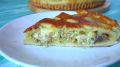 Вкусный праздник для гурманов: куриный пирог с грибами и золотистой корочкой